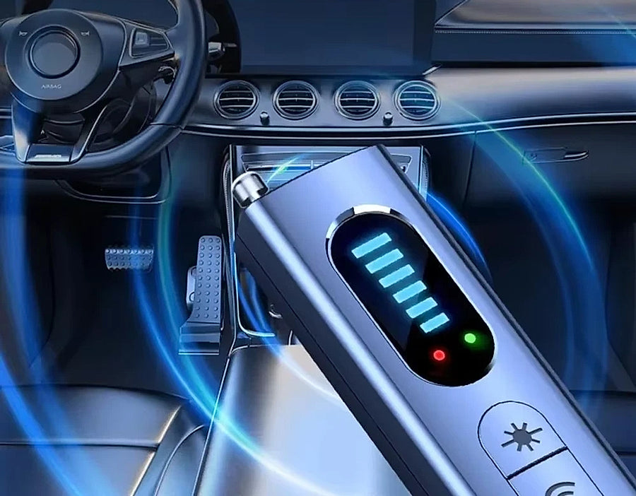 Anti-spy detector scanning a car interior for hidden trackers